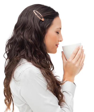 Woman holding warm cup of coffee